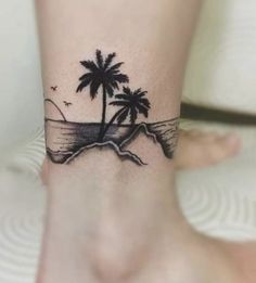 a small palm tree on the ankle tattoo is seen here in this hand - drawn photo