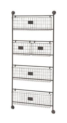 three tiered metal shelf with baskets on top and two wheels in the bottom, against a white background