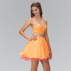 The Cute Dress Made In The Silhouette Of Baby Doll Has A Structural Strapless Top Decorated With Delicate Lace, Which Together With Sparkling Rhinestones Will Create A Glamorous Image, While The Inconspicuous Zipper On The Back Will Ensure A Reliable Fixation Of The Dress. Fabric: Tulle Length: Short Colour: Orange Neckline: Off Shoulder Silhouette: Baby Doll Sleeve: Sleeveless, Strapless Back: Zipper Skirt: Layered Embellishments: Lace, Rhinestones Occasion: Romantic Date/Evening/Dinner, Weddin Sleeveless Orange Prom Dress, Orange Sleeveless Dresses For Prom Season, Orange Sleeveless Dress For Prom Season, Glamorous Orange Sleeveless Dress, Summer Dress With Rhinestones And Sweetheart Neckline, Sleeveless Rhinestone Dress For Spring, Sleeveless Rhinestone Spring Dress, Sleeveless Rhinestone Homecoming Dress, Sleeveless Homecoming Dresses With Rhinestones