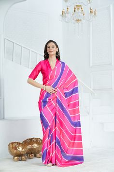 Introducing our stunning Leheriya Print Saree, a  masterpiece that seamlessly combines traditional charm with contemporary elegance. Crafted with utmost care and precision, this saree boasts a mesmerizing leheriya pattern that appeals the Millennial and Gen Z style. our Leheriya Print Saree is for every occasion ,  Whether you're attending a wedding, a festival, or a special occasion, or going to work for ethnic day this saree is sure to make you stand out in the crowd. Designed to accentuate your silhouette, the lightweight fabric of this saree drapes effortlessly, ensuring comfort and ease of movement throughout the day. Its versatility allows you to style it in different ways, from traditional to contemporary, making it a wardrobe essential for every modern woman. Enhance your style quo Fitted Multicolor Silk Pre-draped Saree, Elegant Multicolor Pre-draped Saree With Printed Border, Elegant Multicolor Cotton Silk Pre-draped Saree, Festive Printed Georgette Sets, Silk Pre-draped Saree With Printed Border For Navratri, Multicolor Silk Blouse For Eid, Semi-stitched Silk Pre-draped Saree With Printed Motifs, Multicolor Silk Ikat Print Sets, Fitted Pre-draped Silk Saree With Printed Border