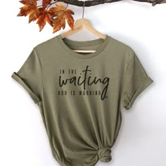 In The Waiting, God Is Working Short Sleeve T-Shirt Meaningful Quote Print Crew Neck T-shirt, Everyday Crew Neck T-shirt With Quote Print, Inspirational Crew Neck T-shirt For Everyday, Inspirational Crew Neck Soft-washed T-shirt, Inspirational Soft-washed Crew Neck T-shirt, God Is Working, Christian Clothes, Christian Shirts Designs, Faith Clothing