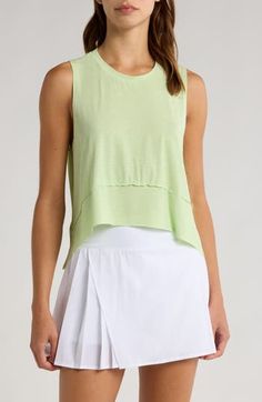 A classic addition to your workout collection, this muscle tee is cut from a soft and stretchy blend that feels breezy and light. 20" length (size Medium) Crewneck Sleeveless 90% polyester, 10% elastane Machine wash, dry flat By Free People; imported Fitted T-shirt For Yoga In Spring, Athleisure Cotton Tank T-shirt, Cotton Tank T-shirt For Athleisure, Athleisure Stretch T-shirt For Spring, Sporty Cotton T-shirt For Light Exercise, Fitted Sleeveless Athleisure T-shirt, Summer Athleisure Muscle Tee With Crew Neck, Summer Crew Neck T-shirt For Light Exercise, Solid Color Summer Workout Tops