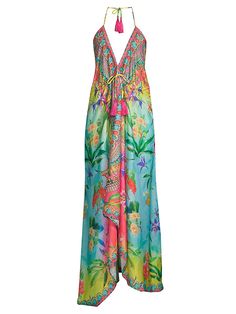 Beautiful Floral Printed Coverup Dress With An Open Back And High-Low Hem. Create A Stunning Beach Look By Pairing This Piece With Oversized Sun Hat And Sunglasses. Halterneck Sleeveless Back Neck Tie High-Low Hem Polyester Dry Clean Imported Size & Fit One Size Fits Most About 48"-60" From Shoulder To Hem Model Shown Is 5'10" (177cm). Womens - W Swimwear > Saks Off 5th. Ranee's. Color: Green Blue Multi. V-neck Tropical Print Beach Dress, Sleeveless Multicolor Dress With Tropical Print, Multicolor Sleeveless Dress With Tropical Print, Tropical Print Halter Neck Dress For Vacation, Tropical Print Halter Neck Vacation Dress, Tropical Halter Neck Dresses For Vacation, Halter Neck Tropical Print Dress For Vacation, Tropical Halter Neck Vacation Dresses, Tropical Vacation Dresses With Halter Neck