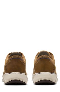 A padded collar adds comfort to this sporty leather sneaker resting on a cushy contoured footbed and lightweight traction sole. Leather upper and lining/synthetic sole Imported Moc Toe Sneakers With Cushioned Footbed For Outdoor Activities, Casual Slip-resistant Walking Shoes, Brown Leather Walking Shoes With Cushioned Footbed, Casual Moc Toe Walking Shoes For Outdoor, Cushioned Round Toe Synthetic Sneakers, Slip-resistant Sneakers For Sports, Rugged Cushioned Slip-on Walking Shoes, Leather Sneakers With White Sole And Arch Support, Casual Moc Toe Walking Shoes For Outdoor Activities