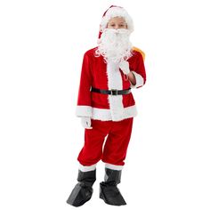 a little boy dressed in a santa costume