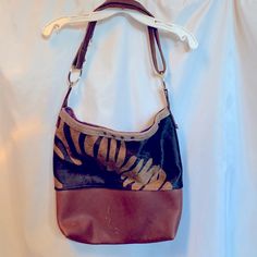 Sturdy Full Grain Leather/Cow Fur Large Bag. Can Be A Crossbody, Tote, Or Shoulder Bag. Handmade By An Oregon Artist With Love. Large Pocket, Detachable Keychain And Tassel On One Side And Printed Fur On The Other. Fully Lined. Never Used But Got A Little Scratched In Transit. See Pics. Leather Patchwork Shoulder Bag, Brown Tote Shoulder Bag With Faux Fur Lining, Vintage Distressed Brown Bags With Waxed Finish, Brown Leather Patchwork Bag, Vintage Distressed Brown Bag With Waxed Finish, Handmade Leather Tote, Large Bag, Full Grain Leather, Handmade Bags