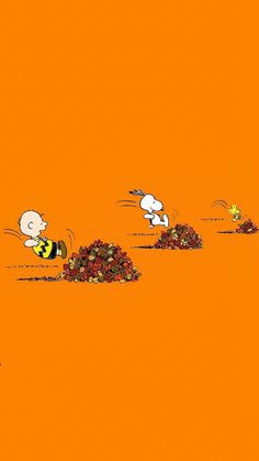 an orange background with cartoon characters in the grass and one dog chasing after another person