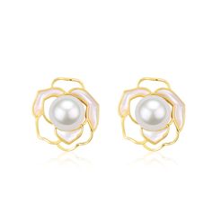 two tone gold plated earrings with white pearls in the center and an open flower design