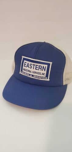 Rare! Missing the button but a true vintage 80's trucker style hat blue collar son! Vintage Blue Adjustable Trucker Hat, Vintage Blue Adjustable Baseball Cap, Vintage Blue Snapback Baseball Cap, Vintage Adjustable Blue Baseball Cap, Vintage Blue Hat With Flat Brim, Vintage Blue Flat Brim Hat, Vintage Trucker Cap For Spring, Vintage Blue Baseball Cap With Curved Brim, Vintage Trucker Hat For Spring