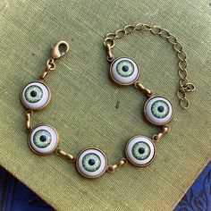 Eye cabochon bracelet in antiqued brass. Choose eye color. Handmade Metal Evil Eye Bracelet, Metal Evil Eye Bracelet, Taurus Ring, Whimsical Gothic, Bohemian Outfits, Cabochon Bracelet, Eye Ball, Ball Bracelet, Cameo Ring