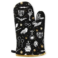 an oven mitt with harry potter symbols on it and gold trimming around the fingers