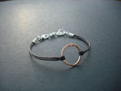 "adorable bracelet made with sterling silver plated little hoop and dark brown leather cord hoop pendant measures 18mm bracelet measures total 7.5\" with 1\" extension chain and closed with silver plated lobster clasp bracelet can be made to any length plus 1\" extension chain so you can adjust length, simply leave a note to seller while check out otherwise you'll get 6.5\" Plus 1\" extension chain. also available in gold; Listing: https://www.etsy.com/listing/85672064/golden-hoop-bracelet-16k-g Simple Adjustable Small Hoop Jewelry, Adjustable Simple Small Hoop Jewelry, Minimalist Brown Nickel-free Jewelry, Silver Minimalist Jewelry With Adjustable Clasp, Minimalist Silver Jewelry With Adjustable Clasp, Minimalist Brown Sterling Silver Jewelry, Everyday Brown Sterling Silver Jewelry, Minimalist Nickel-free Brown Jewelry, Adjustable Circular Everyday Jewelry