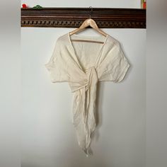 Hackwith Design House Wrap Top. Can Be Worn As A V-Neck Or Reversed With A High Neckline And Open Back. Never Worn. Off White. Chic V-neck Wrap Top For Beach, Off White V-neck Top For Daywear, Off White V-neck Top For Day Out, Off White V-neck Blouse For Day Out, Chic White V-neck Wrap Top, V-neck Wrap Top For The Beach, Chic White Wrap Top, Summer Cotton V-neck Wrap Top, Chic V-neck Wrap Top For Vacation