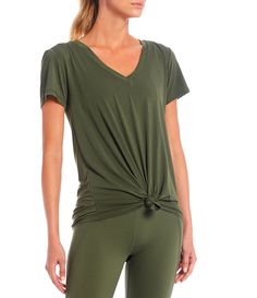 Simply a staple&#033; A classic v-neck top&#x2C; made in a lightweight&#x2C; breathable fabrication. Wear this relaxed tee long & loose for comfort & coverage OR knot it up for a fitted style upgrade. An easy&#x2C; everyday silhouette&#x2C; you will reach for again & again. From Antonio Melani&#x2C; this tee features:Lightweight knit fabricationV-necklineShort sleevesRelaxed fitMoisture-wickingHip lengthStraight hemline Stretch V-neck Top For Loungewear, Green V-neck Stretch Knit Top, Versatile Green V-neck Top, Green V-neck Tops For Layering, Antonio Melani, Style Upgrade, V Neck Tops, Latest Trends, Short Sleeves