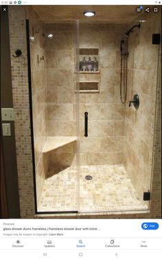 a walk in shower sitting inside of a bathroom