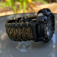 Welcome to Cording2U. We are excited to craft your new personalized custom watch band strap. Please visit our shop for more ideas https://cording2u.etsy.com/  We are a US Military Veteran Owned Business  Thank you for your support🙏 Handcrafted with 100% Nylon Paracord "MADE IN USA".   Our Products include:    ➖Custom handmade watch bands "According to You". No matter how small or big your wrist size, we will craft your perfect fitting band (wrist size picture measurement required).  ➖Variety of Durable Green Watch Bands For Outdoor, Durable Adjustable Watch Bands For Outdoor, Durable Adjustable Outdoor Watch Bands, Adjustable Paracord Watch Bands For Outdoor, Durable Custom Watch Accessories For Everyday Use, Gwg 2000, Bug Out Kit, Personalized Watch, Casio G Shock Watches