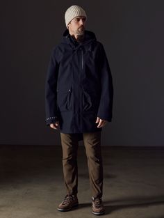 We obsess over the end use of our products because we wear them too. Like our Anders Rain Jacket, seam-sealed, waterproof, and made of bluesign® certified fabric, it’s a resilient yet breathable trench that’s ready to face the elements. Bring this easy-to-pack, versatile layer along for your next adventure. Please note: Built with room for layering. For a classic, tailored AETHER fit, we recommend sizing down. Hooded Gore-tex Outerwear For Rainy Weather, Gore-tex Hooded Outerwear For Rainy Weather, Black Outdoor Parka With Double-lined Hood, Hooded Gore-tex Waterproof Outerwear, Black Long-sleeve Raincoat With Pockets, We Wear, Card Sizes, Rain Jacket, Onyx