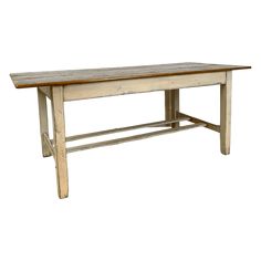 an old wooden table with two legs and a bench on the bottom, against a white background