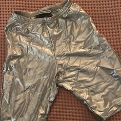 New With Tags Silver Urban Outfitters Biker Shorts Size Xs Tp Sporty Metallic Fitted Bottoms, Metallic Stretch Pants For Summer, Summer Leggings With Built-in Shorts, Streetwear Bottoms With Built-in Shorts, Mid-thigh Length, Metallic Bottoms With Built-in Shorts, Metallic Fitted Shorts, Fitted Metallic Shorts, Short Summer Leggings, Fitted Metallic Short Bottoms