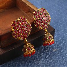 Overview These stylish Jhumki Earrings set from JewelryTrack will certainly leave you spellbound. These Jhumki Earrings set have an excellent finish and gives out an exquisite sense of style. If you are looking for an amazing Fashion Jewelry set for special occasions such as Anniversary, Engagement, Party, Wedding or for gifting , then your search ends here. Item Description: The look is stunning and preciously suitable for all kinds of dressy occasions. Metal: Brass OCCASION: PARTY WEAR , WEDDI Red Cutdana Earrings For Navratri, Festival Celebration Jhumkas Drop Earrings, Festival Jhumkas Drop Earrings, Red Temple Jewelry Chandbalis With Tilla, Red Cutdana Earrings For Puja, Festive Jhumkas For Festivals, Festive Drop Earrings For Festivals, Red Tilla Chandbalis Temple Jewelry, Festive Red Chandbalis With Cutdana