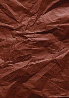 a piece of brown paper that has been wrinkled