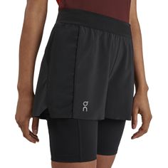 These two-in-one shorts for running and workouts. Includes a stretchy base layer that can be worn solo or with the quick-drying shell overlay. These two-in-one shorts are a combined stretchy base layer and airy outer layer – wear them together or solo. Crush a class in the inner shorts, then add the outer for the run home. However you choose to wear them, the result is soft, stretchy comfort your legs will love and thank you for. The snug fit of the inner tights comes from combining recycled pol Double Down, Running Shorts Women, Flowy Shorts, On Running, Active Wear Shorts, Active Shorts, Running Clothes, Shorts With Tights, Active Women