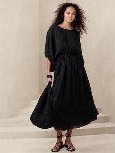 Ethereal and ultra feminine, this midi dress is crafted from a delightfully semi-sheer voile fabric woven of cotton and silk, finished with blouson sleeves and a flowing skirt.  Relaxed fit.  Wide crew neck.  Elastic detail at cuffs and waistband.  Lined bodice and skirt, unlined sleeves.  *This dress runs large.  Consider sizing down.  Relaxed fit.  3/4 sleeves.  Midi length.  Model: Size S, 5'10" (178cm).  *This dress runs large.  Consider sizing down. Extra Dresses, Dress Ethereal, Banana Republic Women Dress, Simple Dress Pattern, Cotton Silk Dress, Dress With Puffy Sleeves, Voile Fabric, Ultra Feminine, Modest Wear