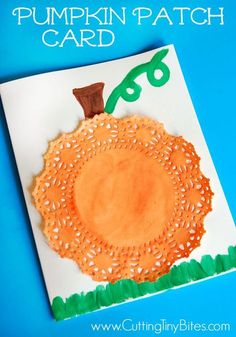 a paper plate with a pumpkin on it and the words pumpkin patch card written in green