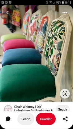 a row of colorful chairs sitting next to each other