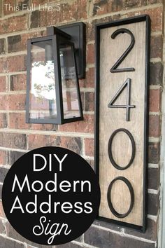 a sign that says diy modern address sign on the side of a brick building