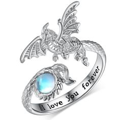 PRICES MAY VARY. Dragon Ring for Women: This Moonstone Dragon Ring is inspired by a dragon, which symbolizes strength, good luck and protection. Moonstone represents the lover's stone, and treat it as a token of beautiful love. Perfect earrings for daily wear, designed specifically for those who love dragon. Sterling Silver Dragon Rings Material: The Adjustable Dragon Ring is made of 925 sterling silver. Lead-free and nickel-free, Hypoallergenic and safety for sensitive skins women. Moonstone Dr Dragon Ring Women, Dragon Themed Wedding, Fantasy Jewelry Ring, Dragon Wedding Ring, Spinning Rings Woman, Moonstone Dragon, Dragon Goddess, Fantasy Rings, Relationship Rings