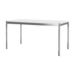 a white table sitting on top of a metal frame