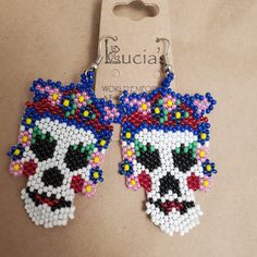 Celebrate Day of the Dead all year long with these delightfully spooky earrings. Hand-beaded in Guatemala under Fair Trade principles. Your purchase helps support our artisan partner's traditional crafts. Spooky Earrings, Sugar Skull Earrings, Skull Earrings, Traditional Crafts, Day Of The Dead, Hand Beading, The Dead, Sugar Skull, Guatemala