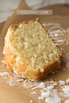 a piece of coconut cake sitting on top of a brown paper bag