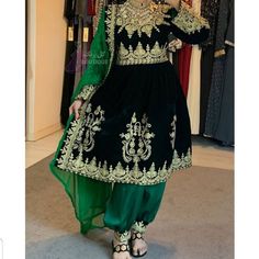 afghan kuchi traditional wedding drees is made of good quality long lasting fabric. Traditionally such Afghanistan Persian Pashtun new design frocks are used as bridal dress. Most of girls also like and recommend such dresses for wedding, Nikkah and Mehndi night events. The dress measurements are kept average. If you need this frock in exact measurements you need, then please send us measurements which best fit on your body Eid Dress With Gold Embroidery And Traditional Drape, Eid Dress With Gold Embroidery In Traditional Drape, Semi-stitched Anarkali Dress With Gold Embroidery, Green Dabka Choli For Eid, Gold Dress With Dabka Work, Gold Dress With Dabka Work On Shantoon, Gold Shantoon Dress With Dabka Work, Green Shantoon Dresses For Wedding, Green Anarkali Embroidered Dress