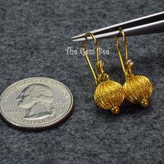 DESCRIPTION: Thank you for coming in! Spectacular 18K solid yellow gold earrings with old stock handmade high karat solid gold lantern earring pendants and rose cut diamond accents! Looks much much nicer in person! WEIGHT: 2.85 Grams DIMENSION: 1.35 Inch Total Length. MATERIAL: 18K Solid Yellow Gold, Diamond Traditional Gold Diamond Cut Earrings, Exquisite Gold Diamond Cut Earrings, Heirloom Gold Dangle Jewelry, Exquisite Gold Filigree Earrings, Traditional 14k Gold Dangle Jewelry, Gold Diamond Cut Earrings Fine Jewelry, Traditional Gold Jewelry With Diamond Cut, 22k Gold Dangle Jewelry For Anniversary, Heirloom Gold Earrings For Gift