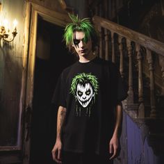 Stand out this Halloween with this edgy neon green-haired skull graphic T-shirt. Perfect for anyone looking to add a spooky touch to their wardrobe, this shirt features a bold, horror-inspired design that's both eerie and stylish. Made from soft, breathable cotton, it's not only perfect for Halloween parties but also comfortable enough for everyday wear. Get ready to turn heads with this unique and eye-catching tee! Halloween Graphic, Skull Halloween, Skull Graphic, Halloween Parties, Mens T Shirts, Halloween Skull, Neon Green, Male Models, Halloween Party