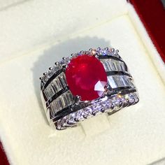 What you see in the pictures, is what you will get! No duplicates or twins! One of a kind FOR VIDEO: https://youtu.be/SOZMRCLmcHU EXTREMELY GORGEOUS AND RARE CERTIFIED NO-GLASS-FILLING, GENTLE HEAT ONLY, VVID, TRANSPARENT, RED RUBY RING. Extremely rare signature VIVID RED, EXTREMELY BEAUTIFUL! VVS CLARITY quality RUBY. With numerous brilliant round & delicate baguette F/VVS diamonds. Set in a LUXURIOUS DESIGNED, 18K solid white gold ring!! One of a kind! ONE OF A KIND! WHAT YOU SEE IN THE PI Modern White Gold Ruby Ring For Formal Occasions, Modern White Gold Ruby Ring For Anniversary, Luxury Silver Ruby Ring For Anniversary, Classic Silver Gia Certified Ruby Ring, Gia Certified Silver Ruby Ring For Formal Occasions, Formal Gia Certified Silver Ruby Ring, Red Ruby Ring, Vvs Diamond, Ruby Diamond