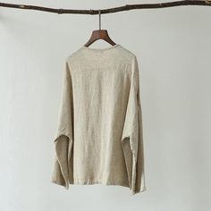 One Size: length 63cm, bust 120cm, sleeve 65cm. Notes:Error within 3cm due to manual measurement (Unit:cm, 1 inch= 2.54 cm, 1 cm= 0.39 inch) Beige Long Sleeve Top With Buttons, Linen Long Sleeve Top With Button Closure, Casual Cotton Collarless Tops, Casual Collarless Cotton Top, Long Sleeve Linen Top With Button Closure, Oversized Beige Buttoned Top, Plain Long Sleeve Linen Top, Fall Cotton Blouse With Split Neck, Oversized Crew Neck Top With Buttons