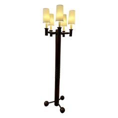 a floor lamp with five lights on it