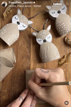 someone is making some deer decorations out of toilet paper