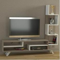 an entertainment center with shelving units and a flat screen tv mounted on the wall