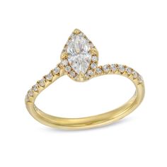 a yellow gold engagement ring with a pear shaped diamond set in the shan shan shan shan shan shan shan shan shan shan shan shan shan shan shan shan shan shan shan shan shan shan shan shan shan shan shan shan