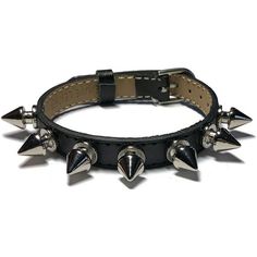 "10mm Spike Studded Leather Bracelet Wristband - Black Leather Spike Studded Wristband - Goth Wristband - Goth Leather Bracelet This black leather wristband is 10mm wide and about 8 inches long. It can fit a wrist from 5.5\" to 7.5\" around. The strap is made of Genuine leather and are stamped as such on the back. They are sewn around the edges for more durability. It has 7 Silver screw back Spike Studs evenly spaced across the center. The band is adjustable and has a nickel tone buckle closure Studded Choker, Black Leather Choker, Gothic Chokers, Hemp Bracelets, Digital Closet, Leather Wristbands, Buckle Bracelet, Leather Chokers, Black Choker