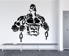 a wall decal with a man's torso and muscles in black on a white background