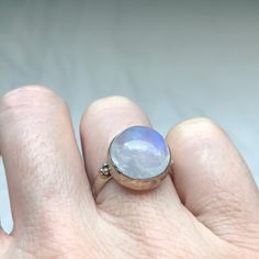 Vintage Rainbow Moonstone 925 Sterling Silver Ring. Blue Flash Round Moonstone Cabochon. Round Setting; Stamped 925. Artisan Made; One Of A Kind Piece. No Trades! Bundle & Save! Boho; Bohemian; Gypsy; Boho Chic; Vintage Jewelry; Vintage Ring; Natural Gemstone; Healing Crystals; Healing Gemstone. Spiritual Sterling Silver Moonstone Birthstone Ring, Minimalist Silver Moonstone Ring With Natural Stones, Minimalist Silver Moonstone Ring, Moon-shaped Sterling Silver Moonstone Ring As Gift, Sterling Silver Round Moonstone Ring With Moon Phase, Silver Moonstone Ring For Healing With Moon Phase, Spiritual Sterling Silver Moonstone Ring With Moon Phase, Sterling Silver Moonstone Birthstone Ring For Healing, Sterling Silver Moonstone Ring For Healing