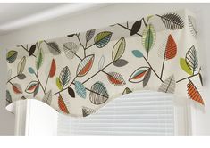 an image of a window valance with leaves printed on it's sides and bottom