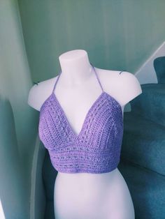 Handmade bralette/crop top, adjustable strap at the back to fit all frames sizes and tie neck straps. This bralette made of lavender/purple colour cotton. Great for summer... Size cup -C,D -mannequin is size 8 cup B Care- hand wash in lukewarm water, dry flat. Thank you for visit:) Grazia Trendy Triangle Crop Top With Built-in Bra, Fitted Purple Crop Top With Built-in Bra, Fitted Purple Seamless Crop Top, Summer Bohemian Backless Crop Top, Bohemian Backless Crop Top For Summer, Bohemian Backless Summer Crop Top, Summer Halter Neck Crop Top With Adjustable Straps, Cotton Halter Neck Crop Top With Built-in Bra, Trendy Triangle Top Crop Top With Built-in Bra