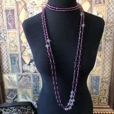 ON SALE Very pretty long purple and clear glass statement necklace that is in excellent vintage condition. Measures 116 inches long which is nice because you can wear it in so many different ways. Very classic addition to any wardrobe or high-end jewelry collection. Elegant Multi-strand Crystal Necklaces For Parties, Elegant Multi-strand Crystal Necklace For Parties, Elegant Purple Lariat Necklaces, Elegant Multi-strand Purple Beaded Necklaces, Elegant Purple Multi-strand Beaded Necklaces, Purple Beaded Necklaces For Formal Occasions, Elegant Purple Beaded Crystal Necklace, Purple Beaded Crystal Necklaces For Party, Elegant Purple Necklace With Faceted Beads