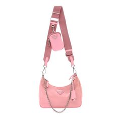 This is an authentic PRADA Nylon Re-Edition 2005 Shoulder Bag in Rosa. This petite messenger bag is crafted of pink nylon with polished silver hardware. It features saffiano cross-grain leather trim an adjustable pink nylon crossbody strap, a silver chain strap, and a removable coin purse. The top zipper opens to a pink Prada monogram jacquard interior. Pink Nylon Shoulder Bag With Detachable Strap, Pink Nylon Bag With Detachable Strap, Pink Nylon Shoulder Bag With Adjustable Strap, Pink Crossbody Shoulder Bag With Silver-tone Hardware, Trendy Pink Shoulder Bag With Silver-tone Hardware, Prada Nylon Re Edition, Pink Prada, Leopard Print Tote, Prada Re Edition